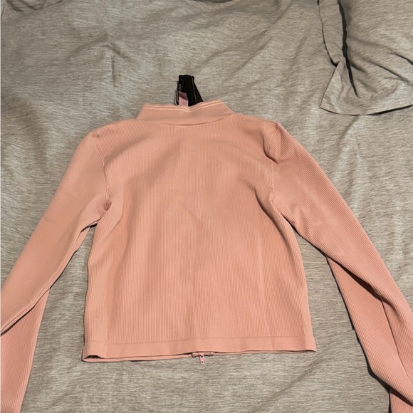 NWT SKIMS NIKE COLLAB Ribbed Seamless Crop Zip Up - Picture 5 of 5